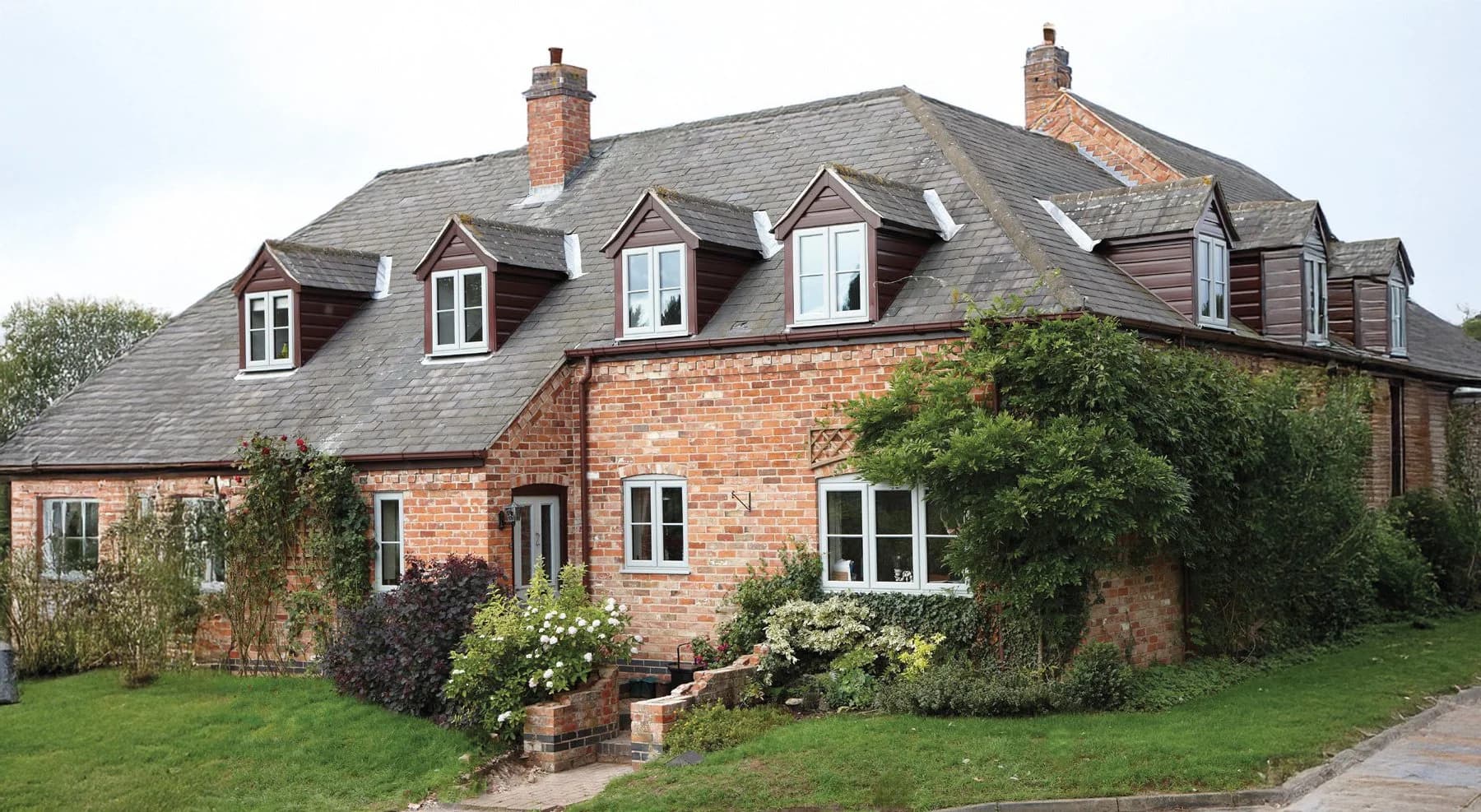 A period cottage fitted with white uPVC casement windows