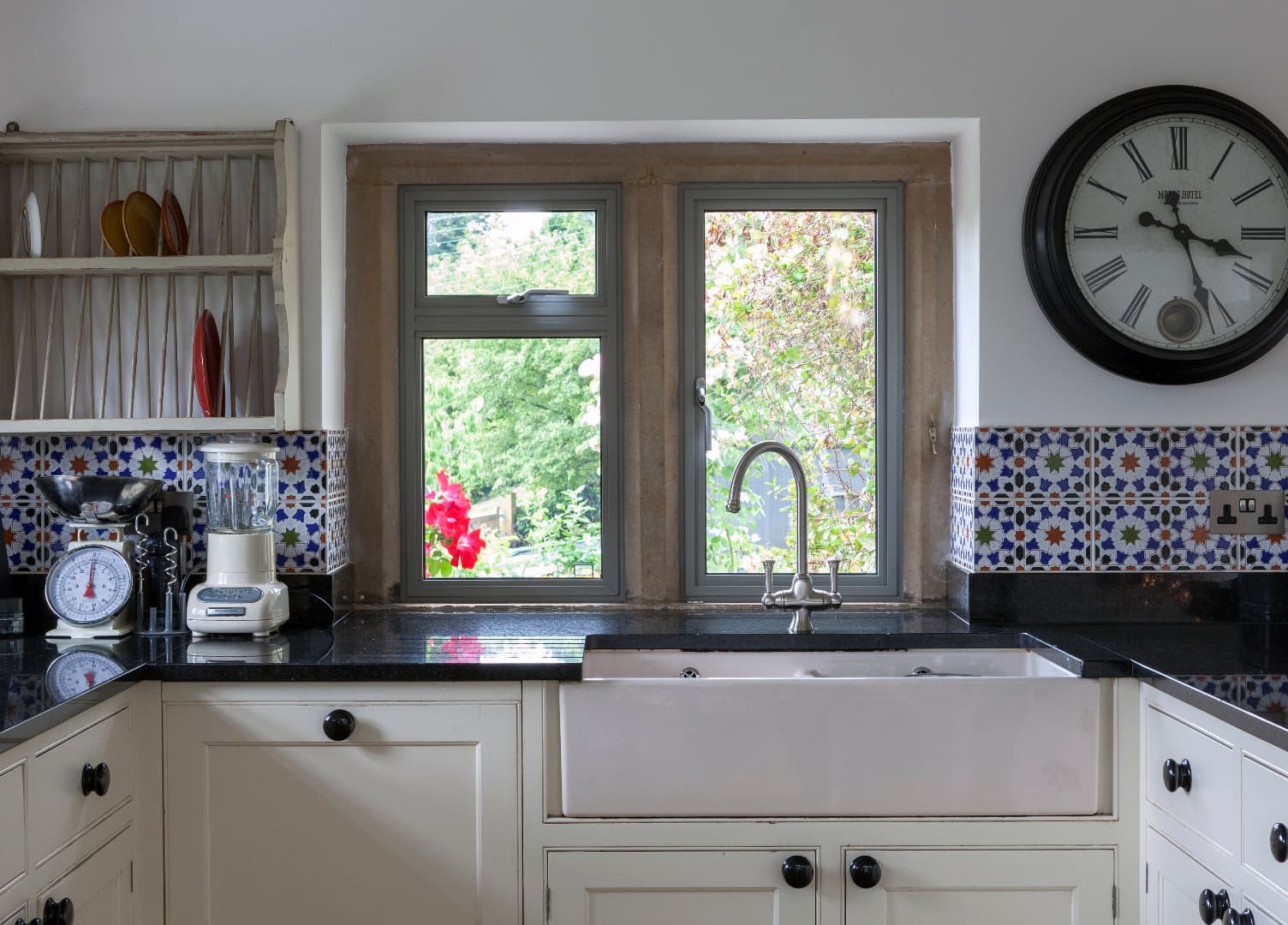 Interior view through an Alitherm Heritage window into a bright kitchen