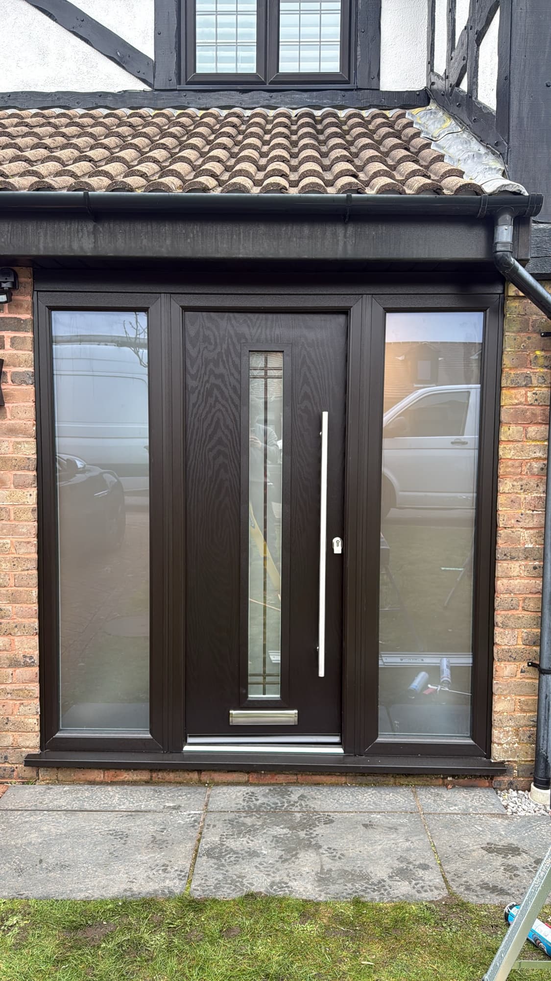 A composite front door in a residential entrance