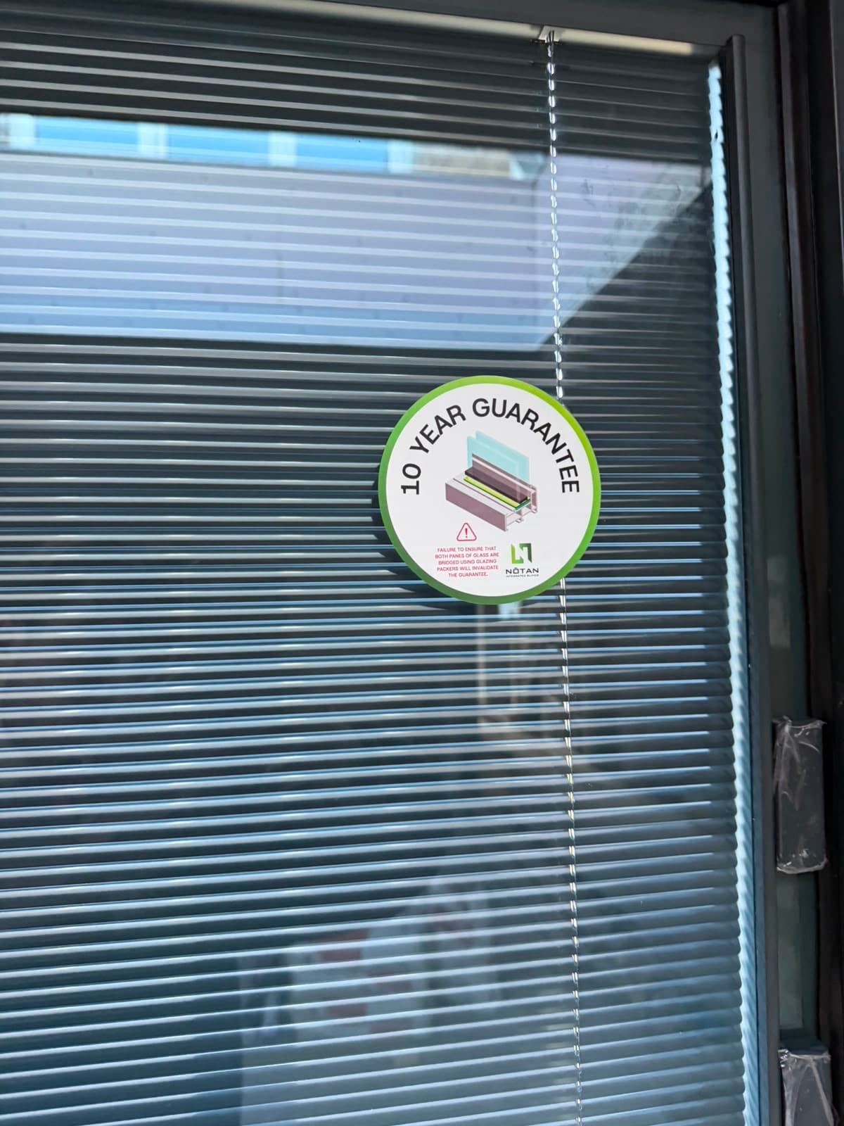 An integral blind fully closed inside an aluminium window