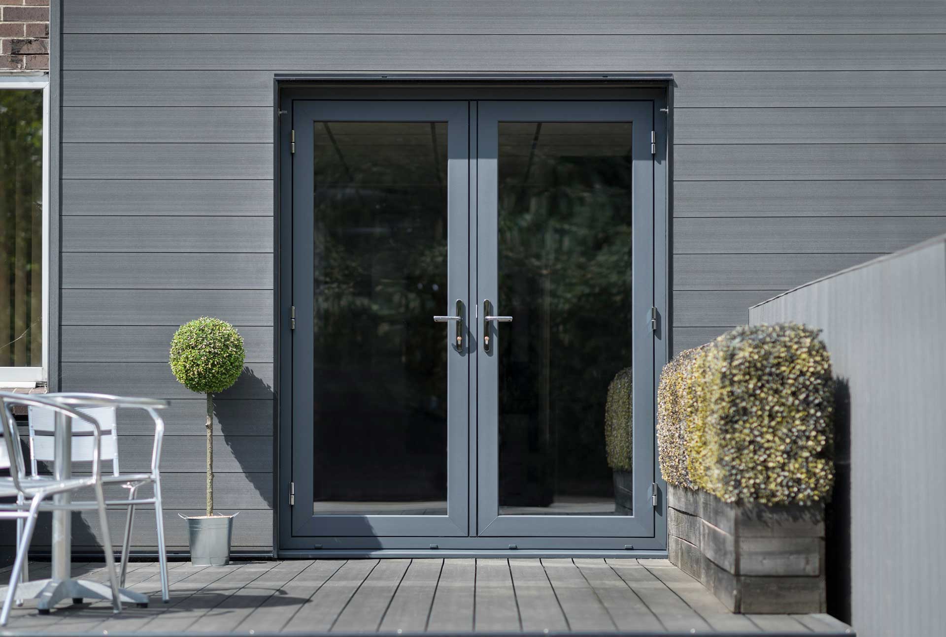 A wide sliding glazed door opening onto a garden